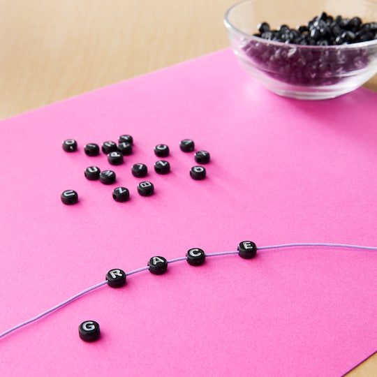 7.5mm Black Alphabet Circular Beads by Creatology™